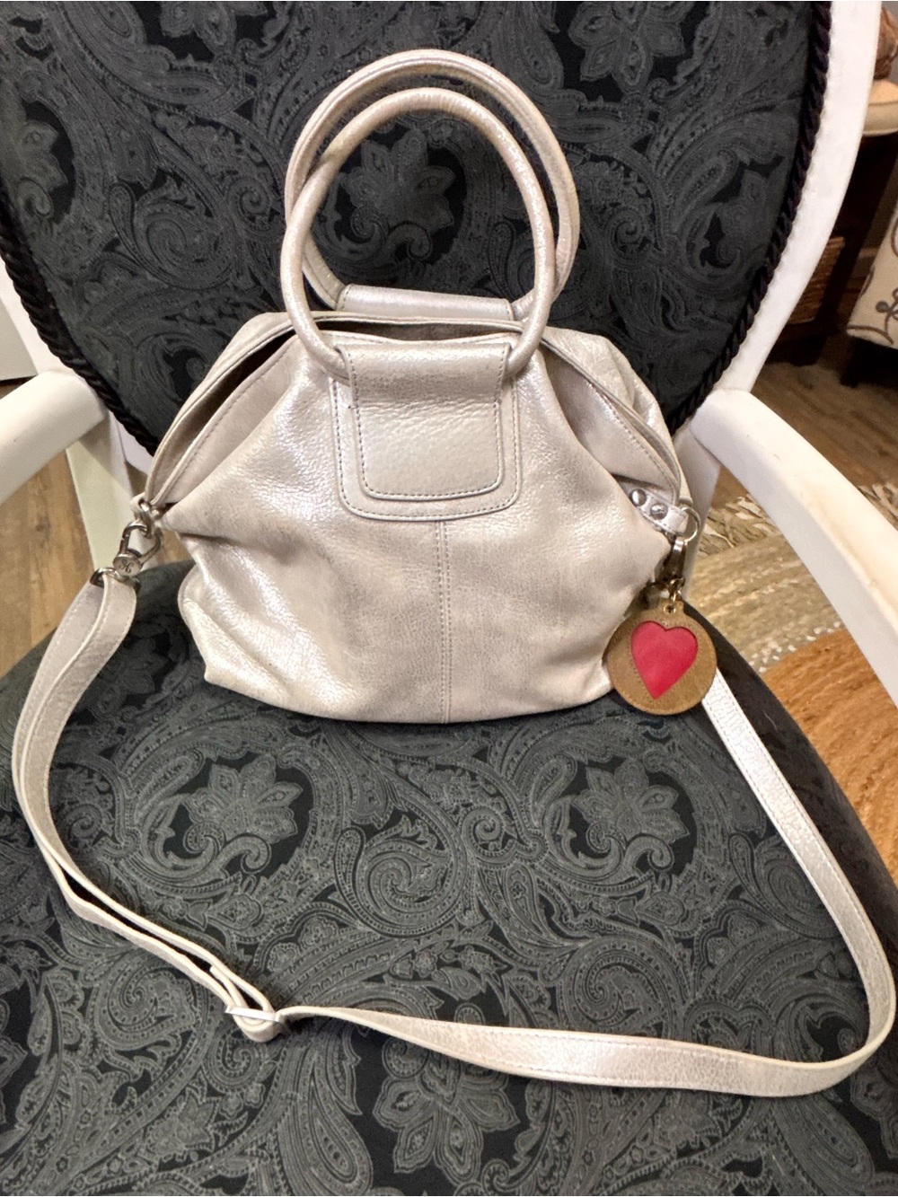 hOBO Metallic Silver Women’s Satchel Bag with Heart Charm